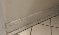 Baseboards detailed by Professional Cleans LLC — before