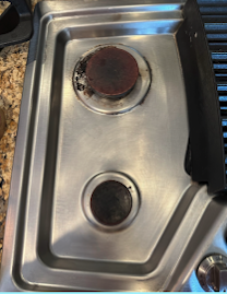Stovetop deep cleaned by Professional Cleans LLC — after